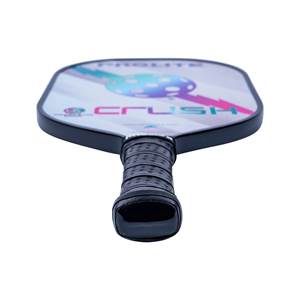 Top-down view of a white pickleball paddle with CRUSH text and a blue and pink graphic.