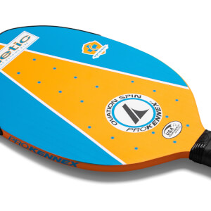 Close-up of a blue and orange pickleball paddle with ProKennex and Ovation Spin branding.