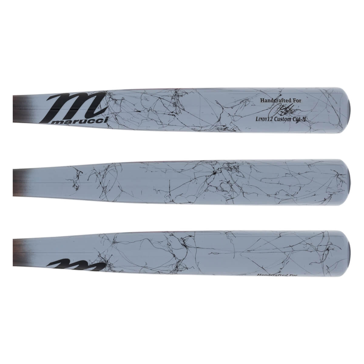 Side view of a gray baseball bat with a black Marucci logo and a marble-like pattern.