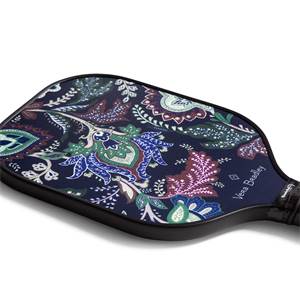 Corner view of a navy pickleball paddle with a paisley floral print and Vera Bradley text.