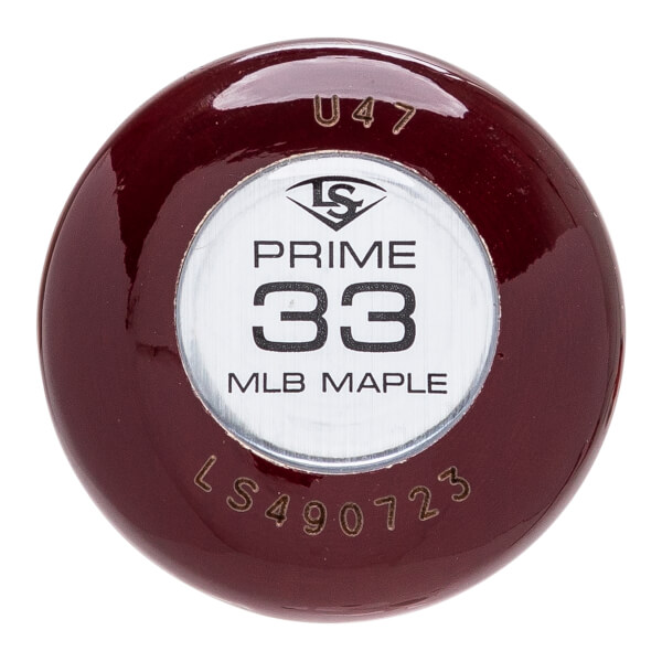 Top-down close-up of a maroon baseball bat end with a silver label showing PRIME 33 MLB MAPLE, stamped U47, and LS490723.