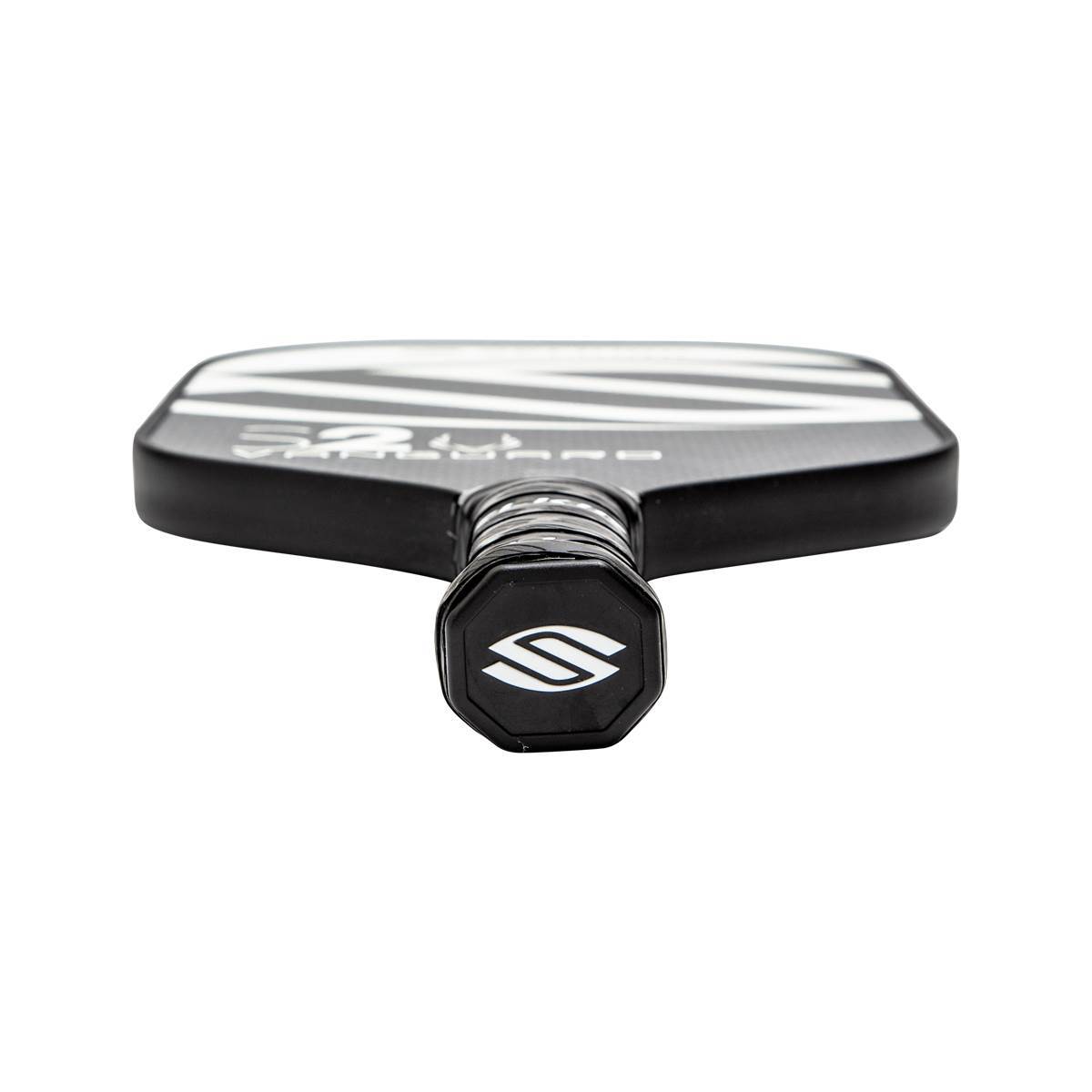 Bottom view of a black pickleball paddle with white diagonal stripes and an S logo on the grip.
