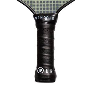 Close-up of a black pickleball paddle grip with Armour branding and a textured surface.