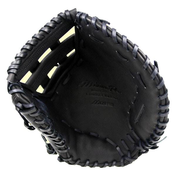 Top-down view of a black Mizuno Pro Series first base mitt with dark blue lacing and embossed branding.