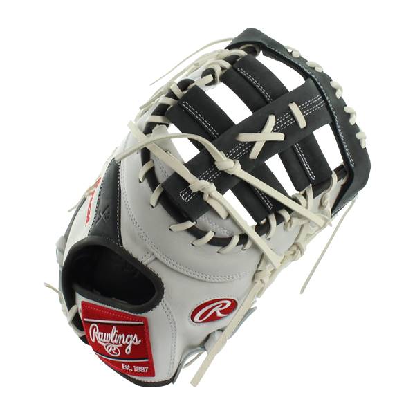Top-down view of a white and black first base mitt with a red Rawlings logo and Est. 1897 text.