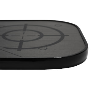 Corner view of a black pickleball paddle with a target graphic and textured surface.