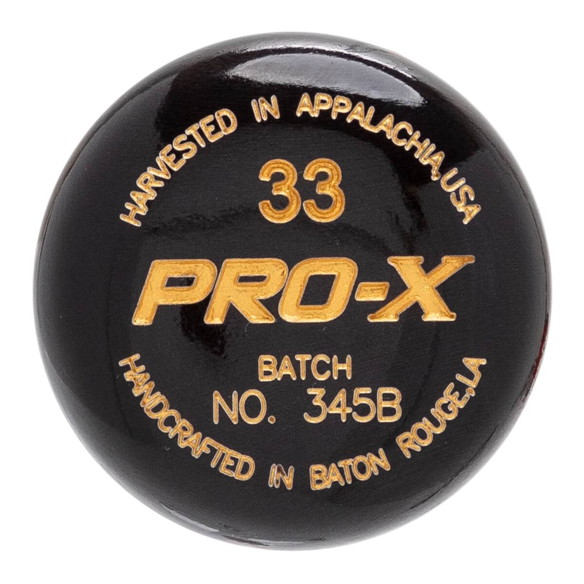 End view of a black baseball bat with gold text PRO-X, 33, BATCH NO. 345B, HARVESTED IN APPALACHIA, USA, and HANDCRAFTED IN BATON ROUGE, LA.