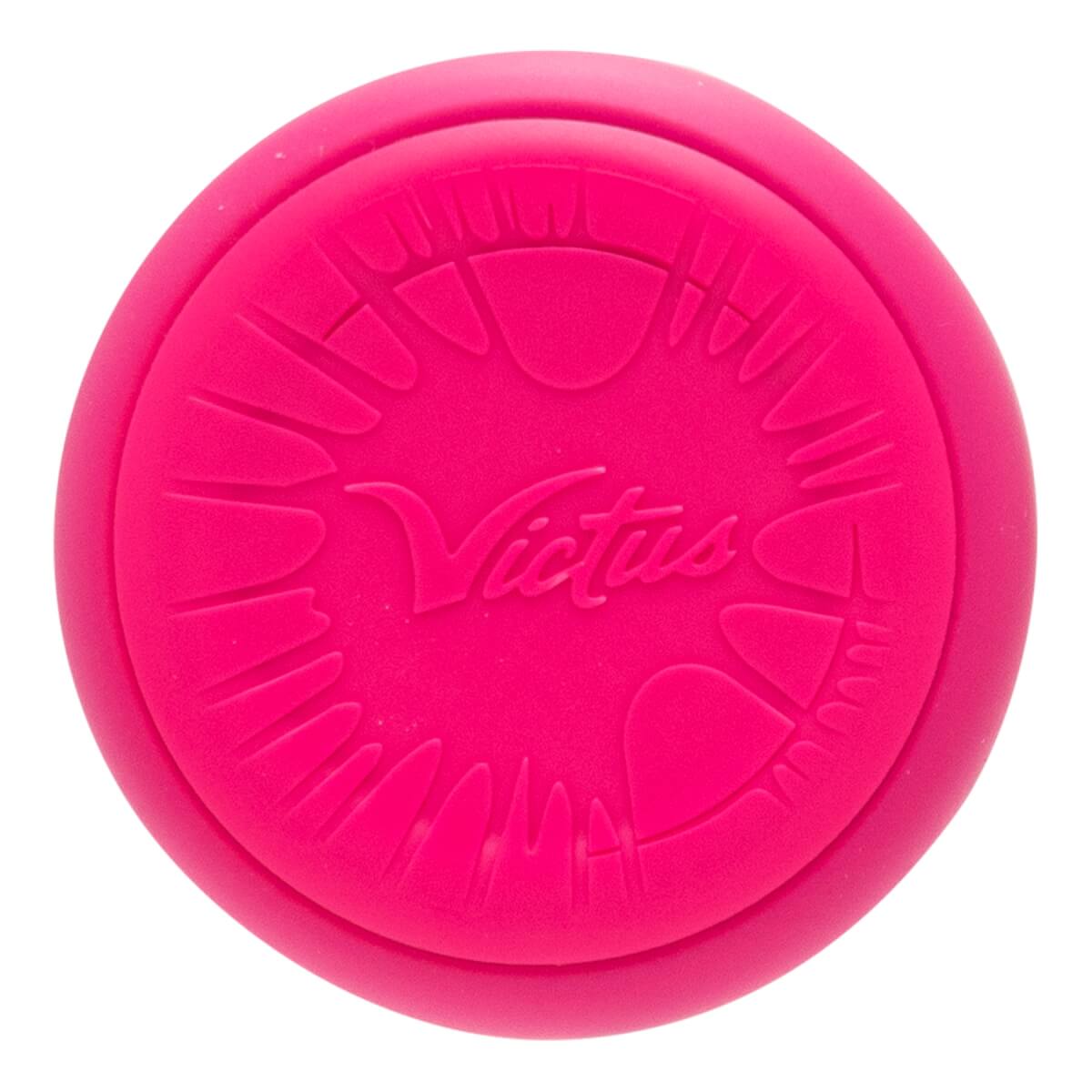 Top-down view of a bright pink baseball bat end cap with an embossed Victus logo and radial textured pattern.