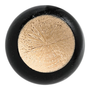 Top-down view of a black baseball bat end with exposed wood grain.