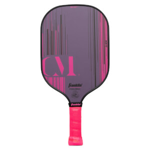 Front view of a purple and pink Franklin pickleball paddle with CM initials, vertical lines, and a bright pink grip.