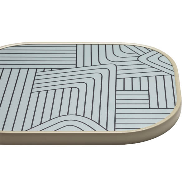Corner view of a light blue pickleball paddle with a geometric black line pattern and a beige edge.