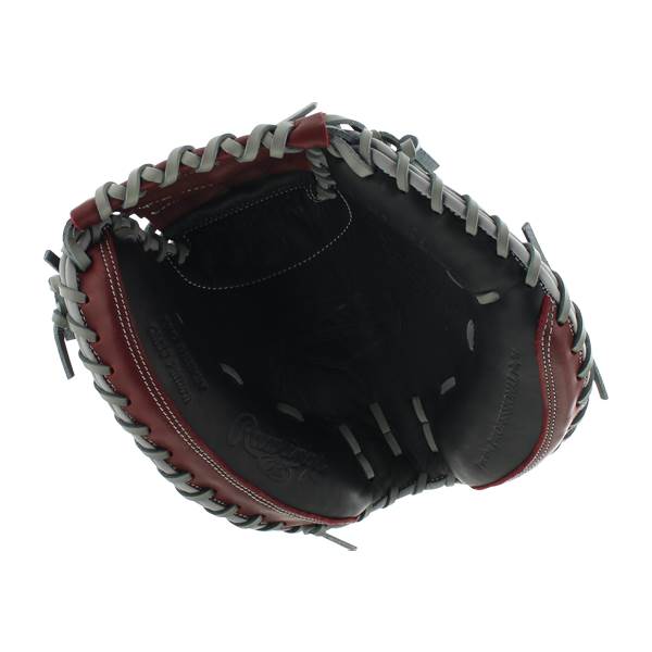 Top-down view of a black and red catchers mitt with Rawlings logo and grey lacing.