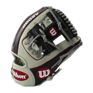 Side view of a tan and black baseball glove with red trim and Wilson branding.