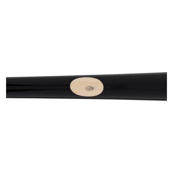 Close-up of a black baseball bat with an oval wood-grain patch on its smooth surface.