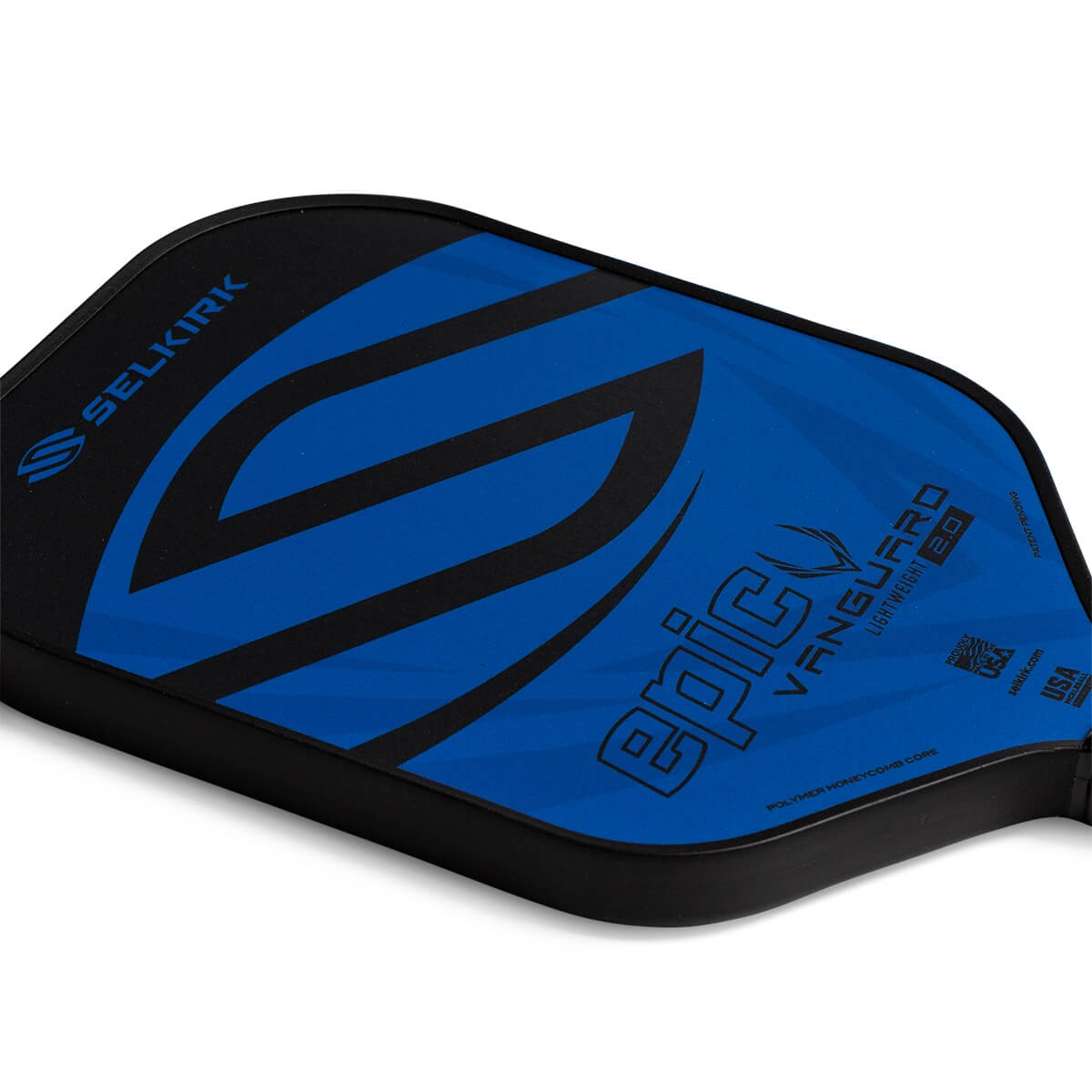Corner view of a blue Selkirk VANGUARD 2.0 Epic paddle with black graphic accents and visible text.
