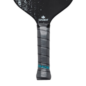 Close-up of a black pickleball paddle grip with gray spiral tape and DIADEM text.
