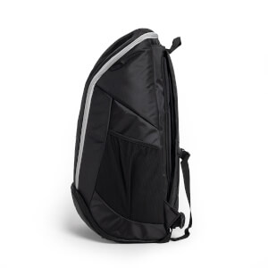 Side view of a black pickleball backpack with a silver zipper and mesh side pocket.