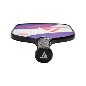 Top-down view of a purple pickleball paddle with a white and pink geometric design and black grip.