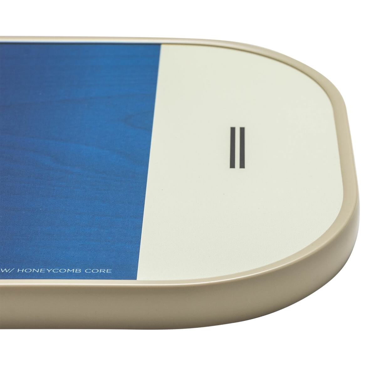 Corner view of a cream and blue pickleball paddle with a double black line logo and HONEYCOMB CORE text.