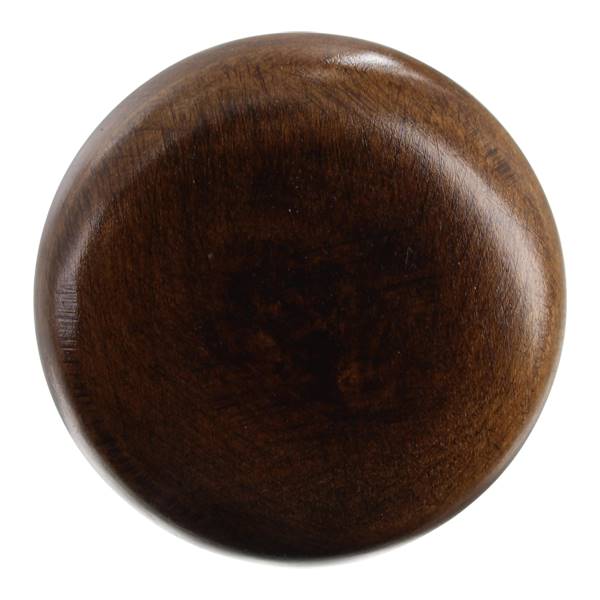 Top-down view of a dark brown wood baseball bat knob with visible wood grain.