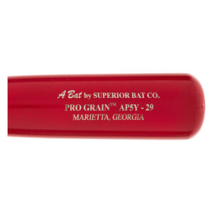 Close-up of a red baseball bat with A Bat by SUPERIOR BAT CO., PRO GRAIN™ AP5Y-29, and MARIETTA, GEORGIA printed on it.