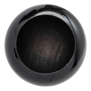 Top-down view of a black baseball bat end with a hollowed center and visible wood grain.