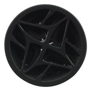 Top-down view of a black softball bat end cap with a geometric, segmented design.
