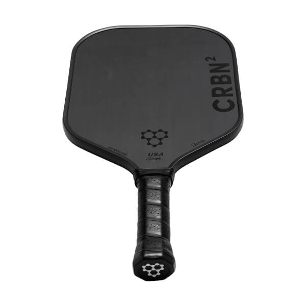 Top-down view of a black pickleball paddle with CRBN² branding, a honeycomb logo, and USA Pickleball text.