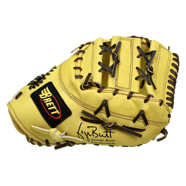 Front view of a yellow baseball glove with a black BRETT logo and George Brett Recommends signature.