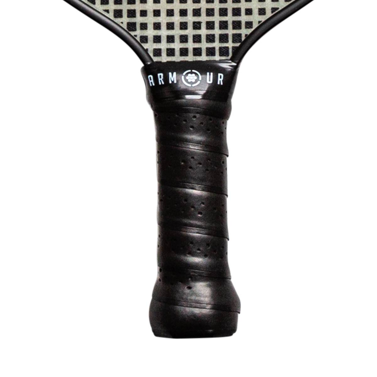 Close-up of a black pickleball paddle grip with ARMOUR text and a perforated surface.