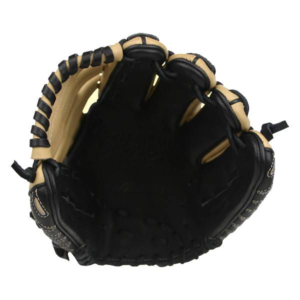 Top-down view of a black and tan baseball glove with stitched detailing and a deep pocket.