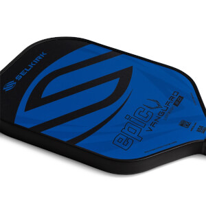 Corner view of a blue Selkirk VANGUARD 2.0 Epic paddle with black graphic accents and visible text.