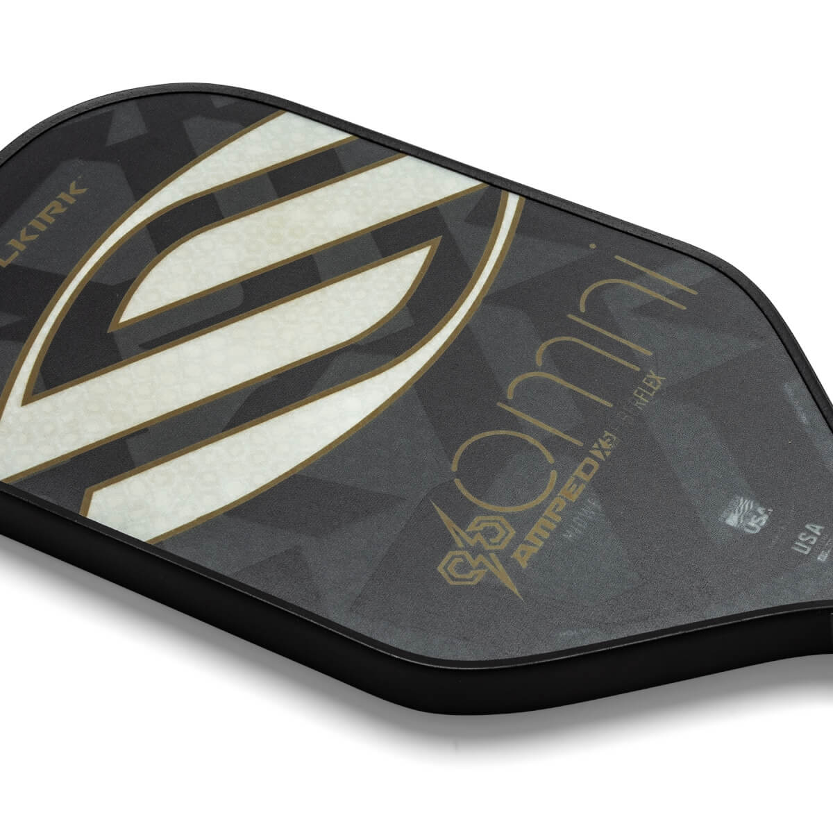 Top-down view of a black pickleball paddle with a large white and gold S graphic and omni text.