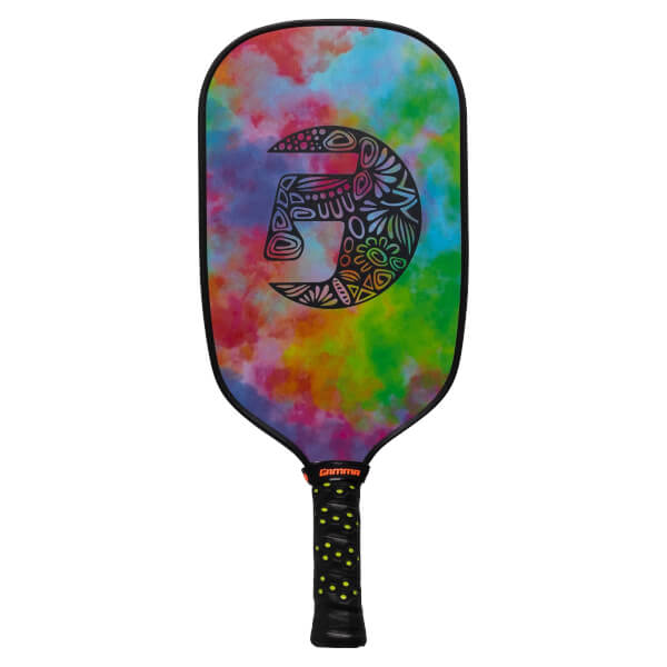 Front view of a tie-dye pickleball paddle with a black tribal G logo and yellow-dotted grip.