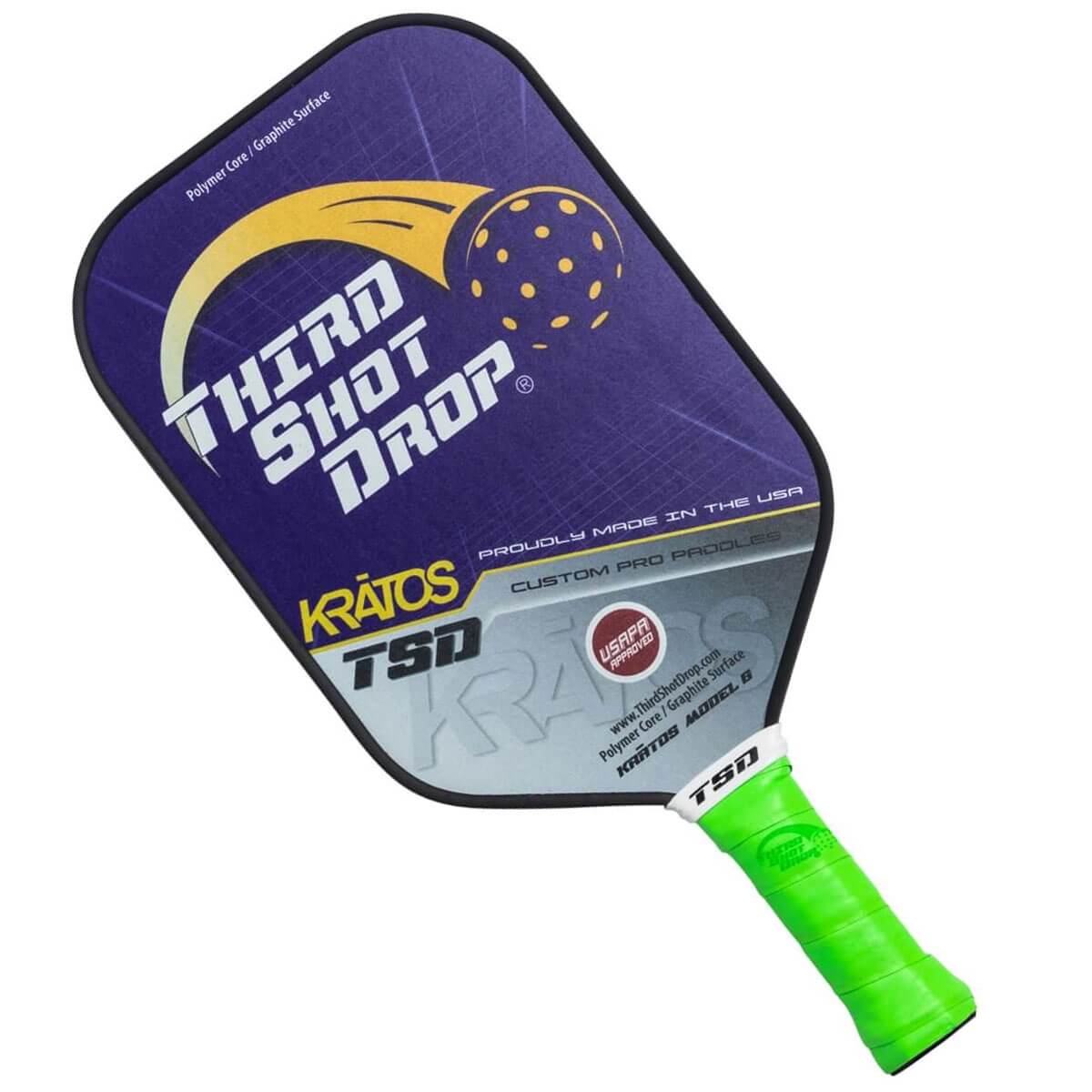 Corner view of a purple pickleball paddle with Third Shot Drop logo and green grip.