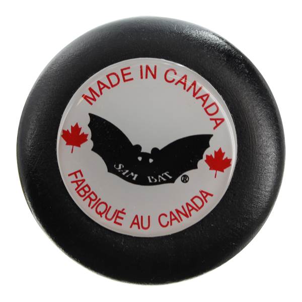 End view of a black baseball bat with a white circular logo featuring a bat silhouette, red maple leaves, and MADE IN CANADA text.