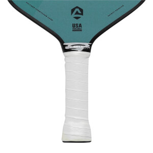 Top-down view of a teal pickleball paddle with white grip, Selkirk logo, and USA Pickleball Approved text.
