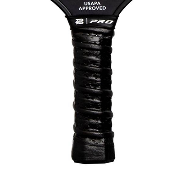 Close-up of a black pickleball paddle grip with B | PRO logo and USAPA APPROVED text.