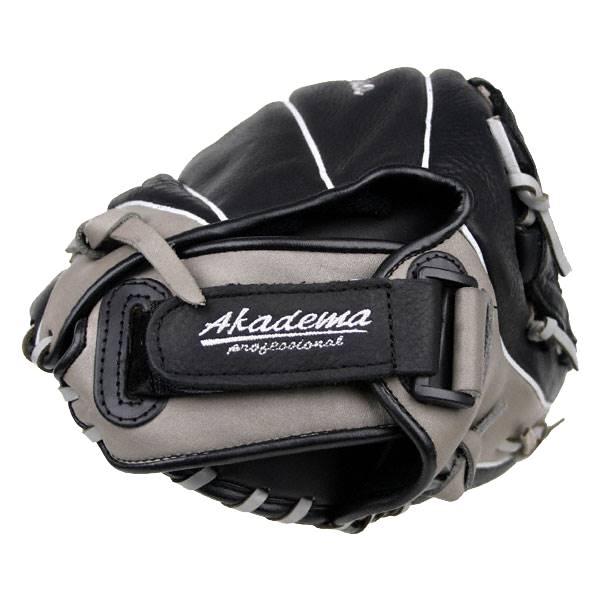 Side view of a black and gray baseball glove with Akadema professional branding and white stitching.