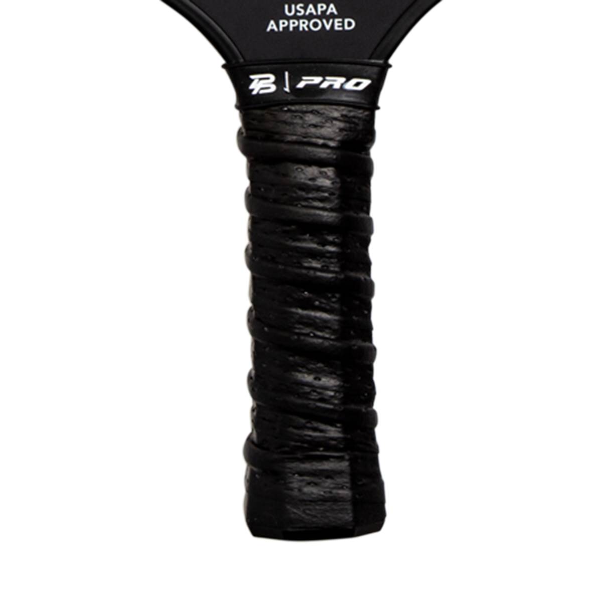 Close-up of a black pickleball paddle grip with B | PRO logo and USAPA APPROVED text.