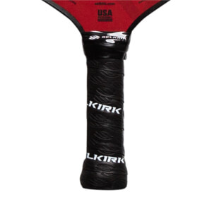 Close-up of a black pickleball paddle grip with KIRK branding and a red top with USA text.