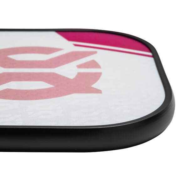 Corner view of a white pickleball paddle with pink graphic and black edge.