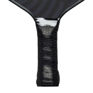 Close-up of a black pickleball paddle grip with a geometric pattern and a silver band.