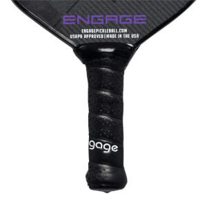 Close-up of a black pickleball paddle grip with perforated texture and gage logo.