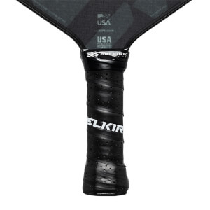 Close-up of a black pickleball paddle grip with perforated texture and white ELKIR branding.