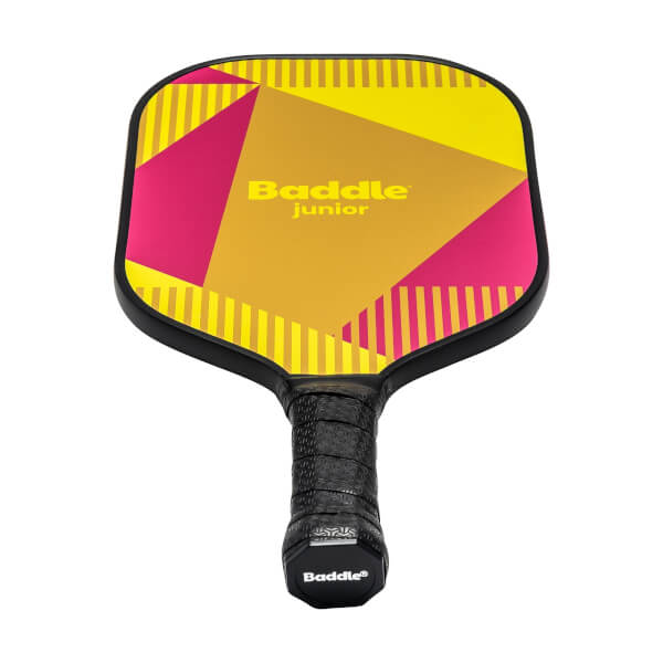 Front view of a yellow and pink pickleball paddle with geometric patterns and Baddle Junior text.