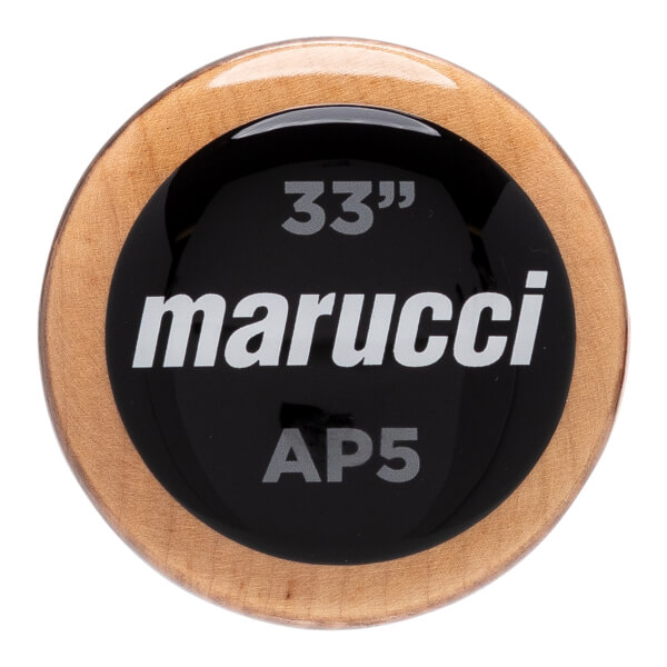 Top-down close-up of a natural wood baseball bat barrel with a black circular insert displaying marucci, 33, and AP5.