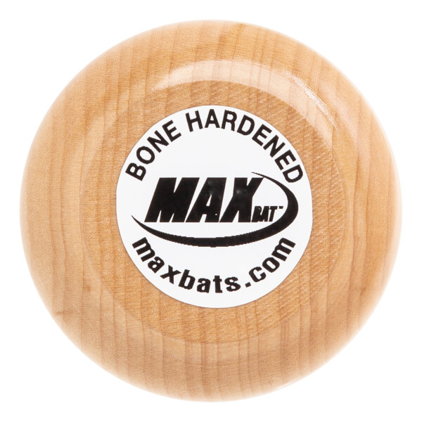 Top-down view of a natural wood baseball bat knob with a white sticker showing MAX BAT, BONE HARDENED, and maxbats.com.