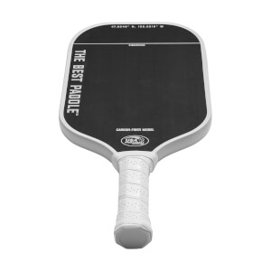 Top-down view of a white and black pickleball paddle with THE BEST PADDLE text and USA Pickleball logo.