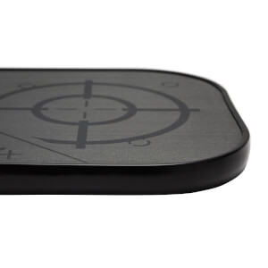 Side view of a black pickleball paddle with a target graphic and textured surface.